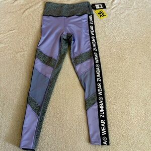 Zumba High Waisted Panel Ankle Leggings in the color Orchid. NWT. Women’s XS